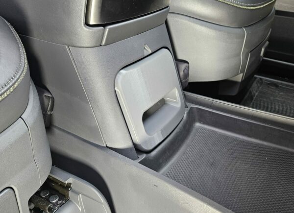 RCS Safe (stock version) installed in Rivian Camp Speaker console, in the closed position, angled view