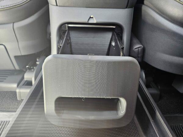 RCS Safe (stock version) installed in Rivian Camp Speaker console, in the opened position, front view